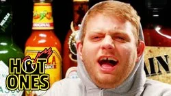 Mac DeMarco Tries to Stay Chill While Eating Spicy Wings