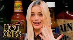 Margot Robbie Pushes Her Limits While Eating Spicy Wings
