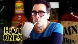 Dan Levy Gets Panicky While Eating Spicy Wings