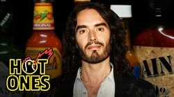 Russell Brand Serenades Superfan Brett Baker While Eating Spicy Wings