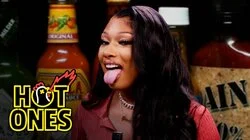 Megan Thee Stallion Turns Into Hot Girl Meg While Eating Spicy Wings