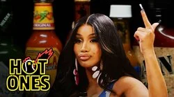 Cardi B Tries Not to Panic While Eating Spicy Wings