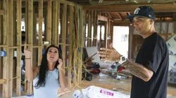 House Held Up by Car Jacks