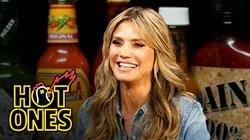 Heidi Klum Strikes a Pose While Eating Spicy Wings